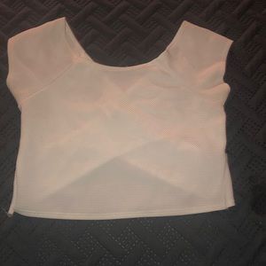 Cropped slightly off the shoulder tee